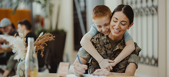 Soldier woman and child writting on a notebook